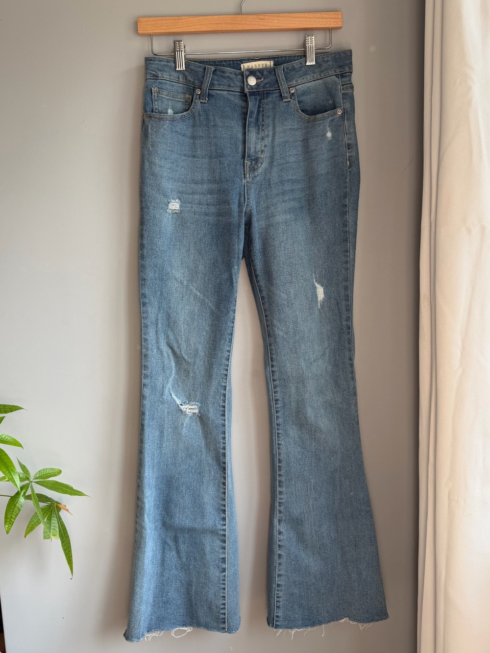 Mid-Rise Distressed Flared Jeans in Washed Blue